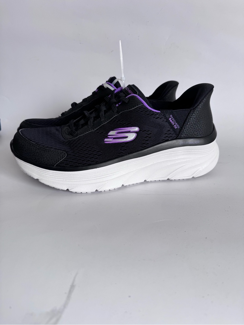 Skechers Women’s Black Sneakers with Purple Highlights and White Sole